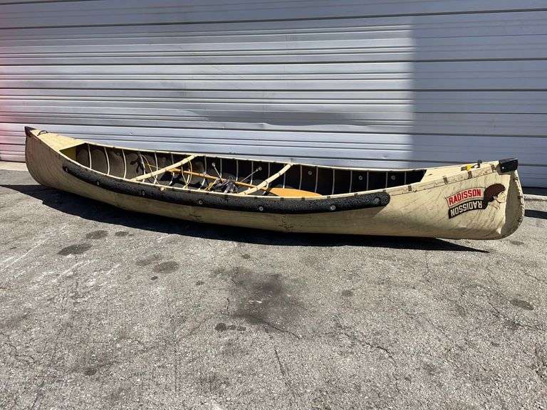 Radisson Canoe with Oars 777 Auction Company