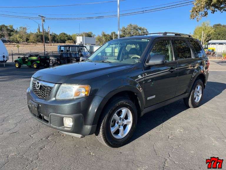 2008 Mazda Tribute Hybrid with 196k miles smogged 777 Auction Company