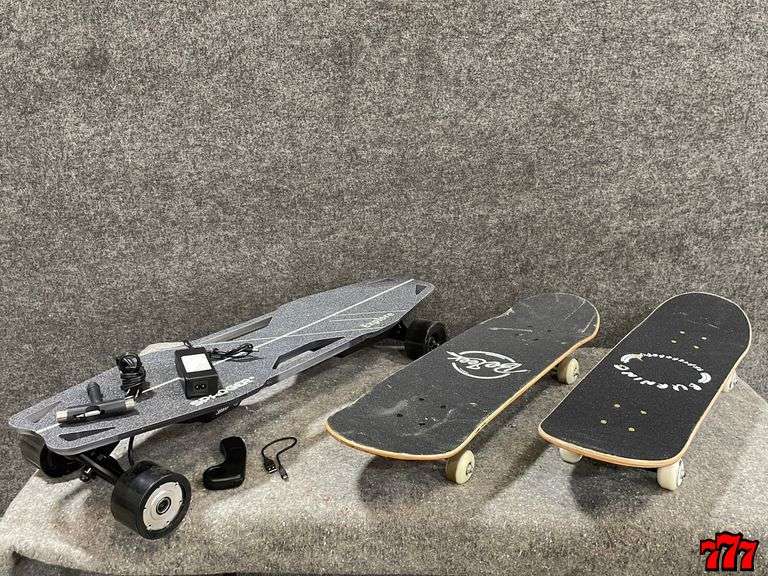1 Electric Skateboard & 2 Regular Skateboards 777 Auction Company