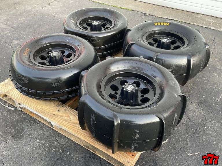 4 Doonz 25.5 X 1312 Paddle Tires 777 Auction Company