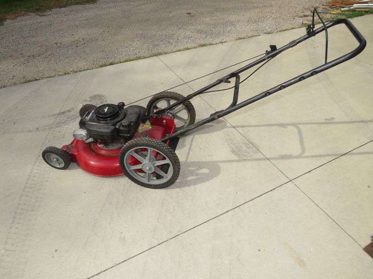 4.5 HP Murray 20" mower. We started it with starting fluid. AAA