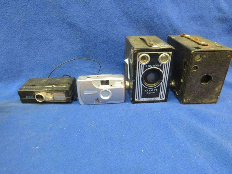 Old cameras, flashbulbs, and other vintage camera equipment AAA