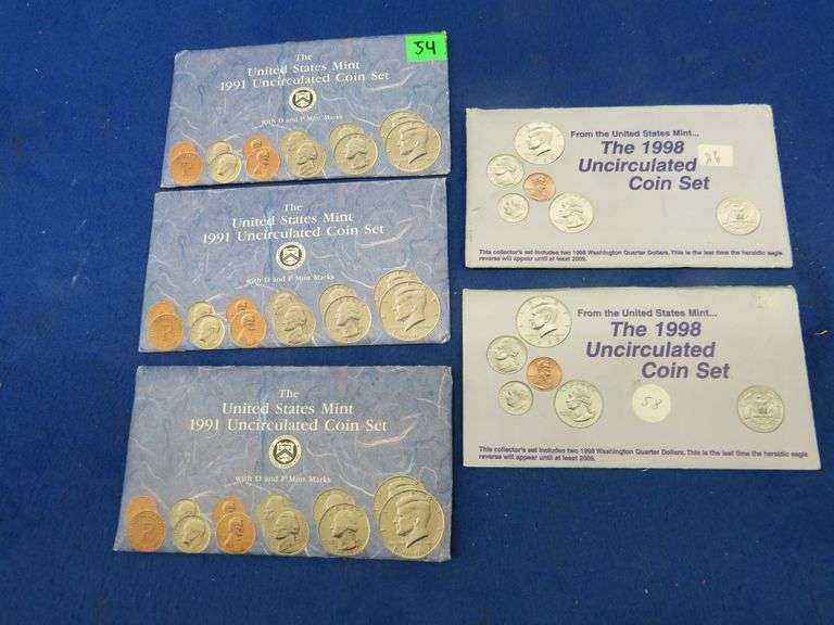 Three 1991 US Mint uncirculated sets and two 1998 sets. Both sets