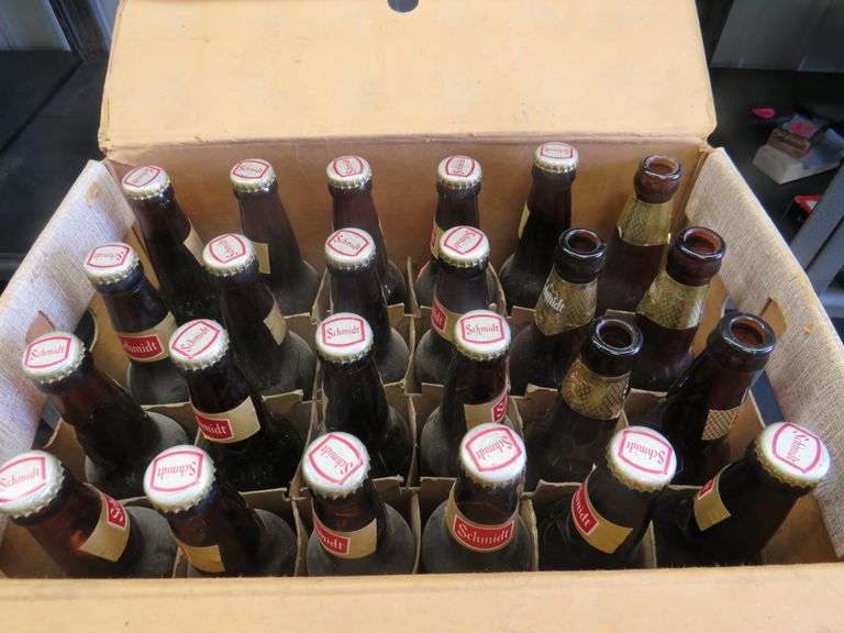 Full case of old Schmidt beer bottles. 19 are unopened. AAA Auction
