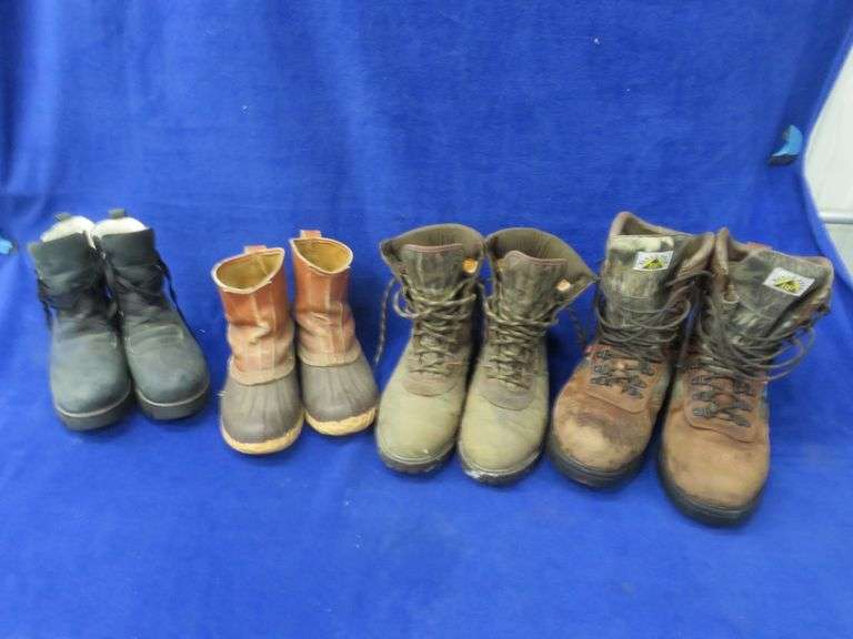 Four pairs of boots. The men's hunting boots are size 9.5. Some are