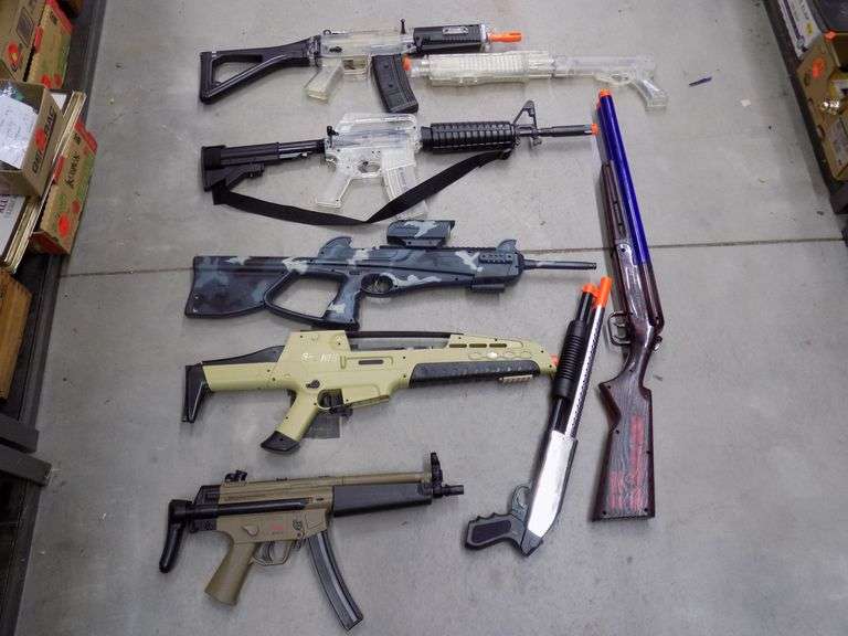 Eight untested airsoft rifles AAA Auction and Realty