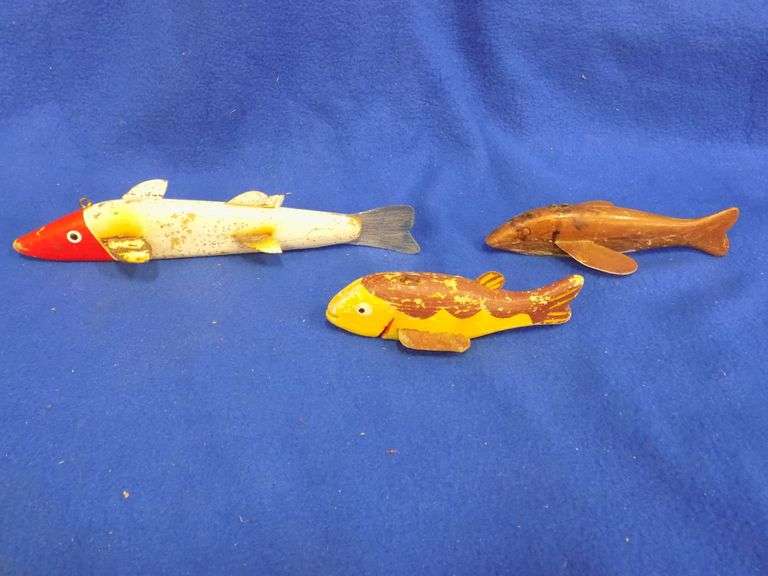 Three vintage handcarved spearing decoys AAA Auction and Realty