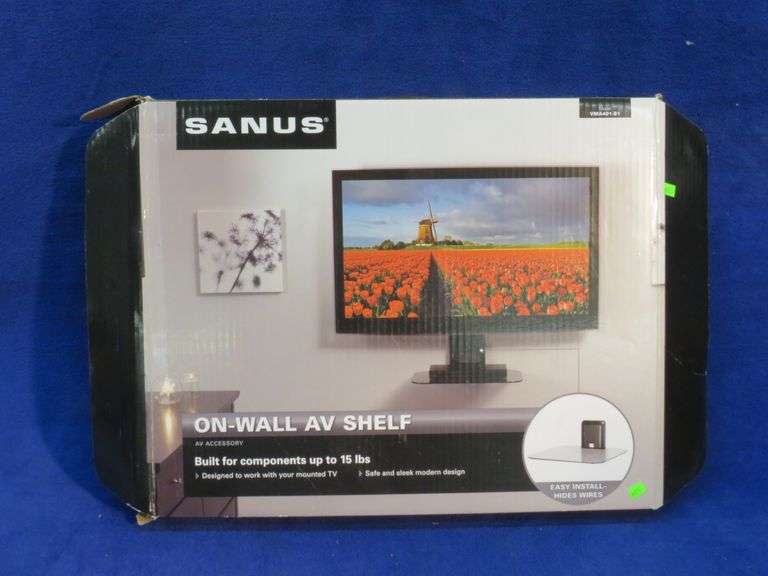 Sanus on wall AV shelf in original packaging AAA Auction and Realty