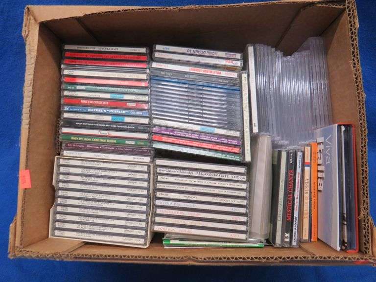 CDs and blank CD cases AAA Auction and Realty