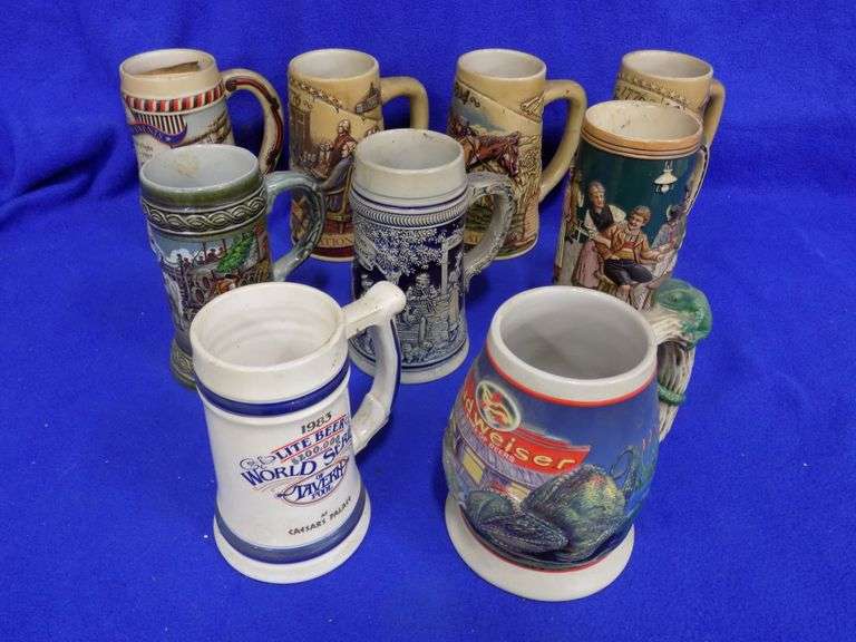 Nine beer steins, some numbered AAA Auction and Realty