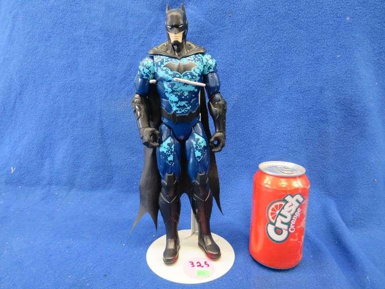 12" tall Batman action figure with a stand. AAA Auction and Realty