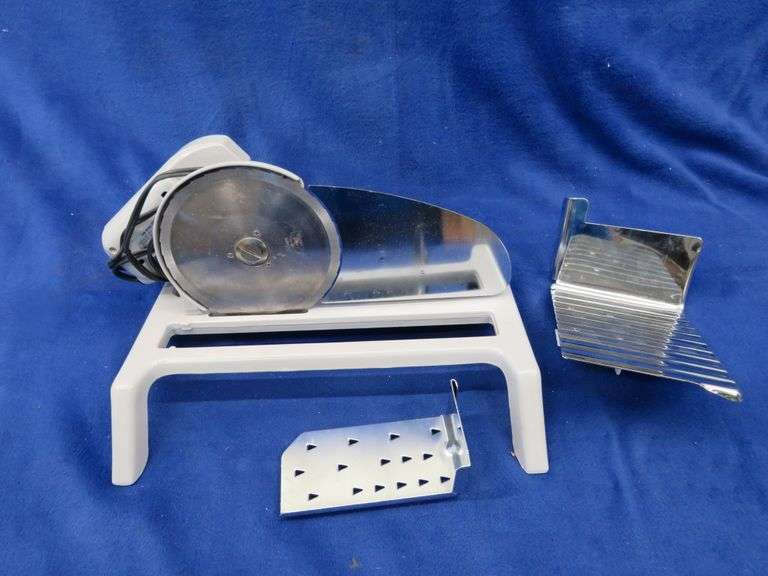 Rival electric food slicer. Good condition. AAA Auction and Realty