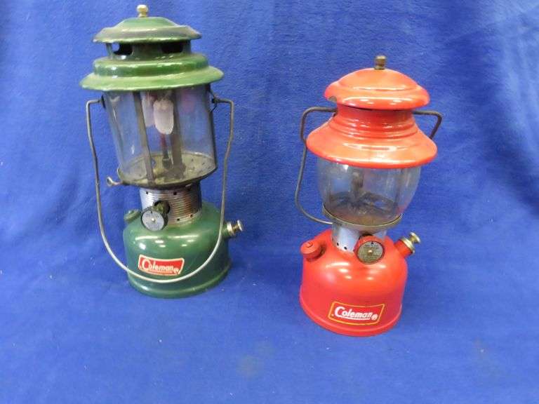 Two vintage Coleman lanterns, Red one from 1961, and Green one from