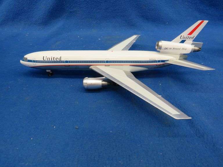 Inflight 200 United DC10 polished Friend Ship model airplane with original packaging.  1/200 scale