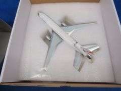 Inflight 200 United DC10 polished Friend Ship model airplane with original packaging.  1/200 scale