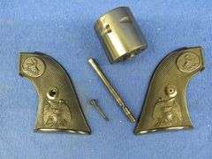 22 Colt peacemaker grips and magnum cylinder
