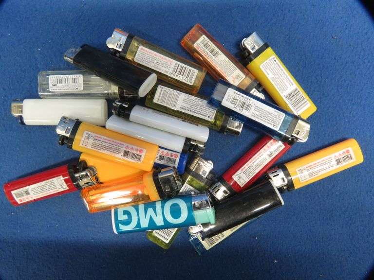 21 cigarette lighters, all with fluid AAA Auction and Realty
