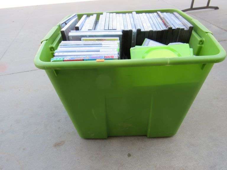 Sterilite 20gallon tote with over 100 DVD's AAA Auction and Realty