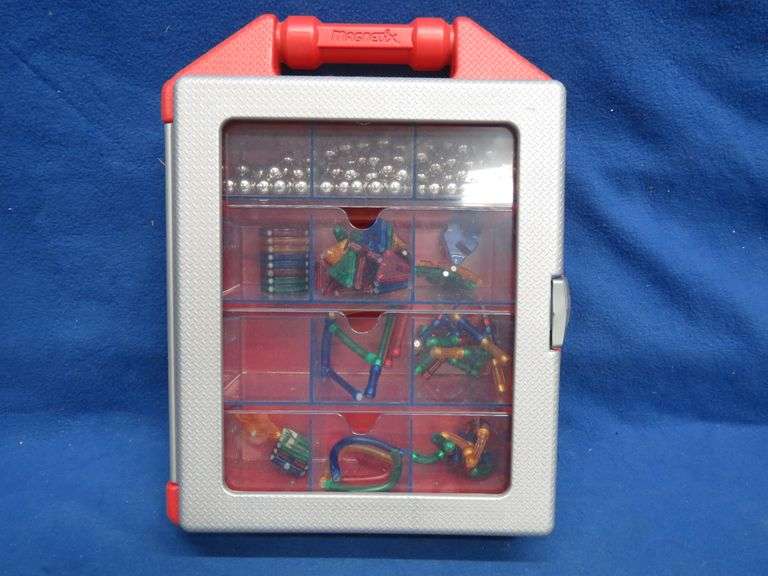 toy pieces in a case AAA Auction and Realty