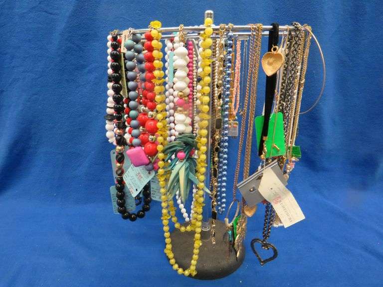 22" tall spinning jewelry display rack with over 50 necklaces AAA Auction and Realty
