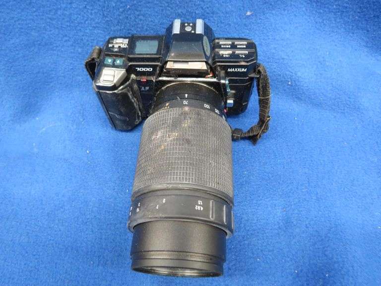 35mm cameras, lenses, cases, and more AAA Auction and Realty
