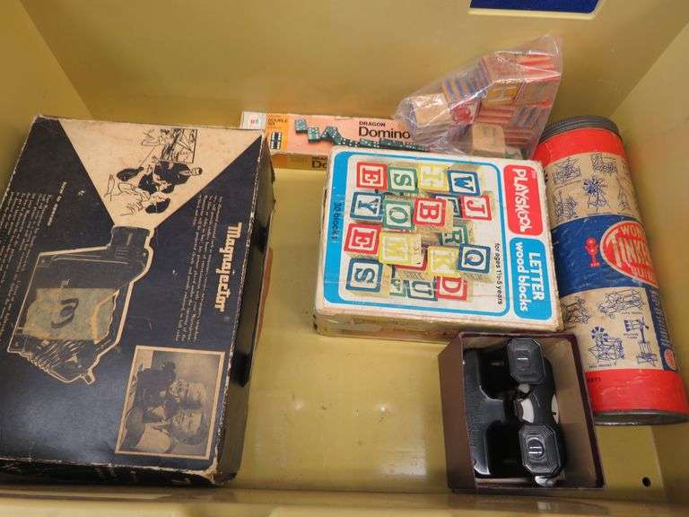 Vintage toys and games with a plastic crate AAA Auction and Realty