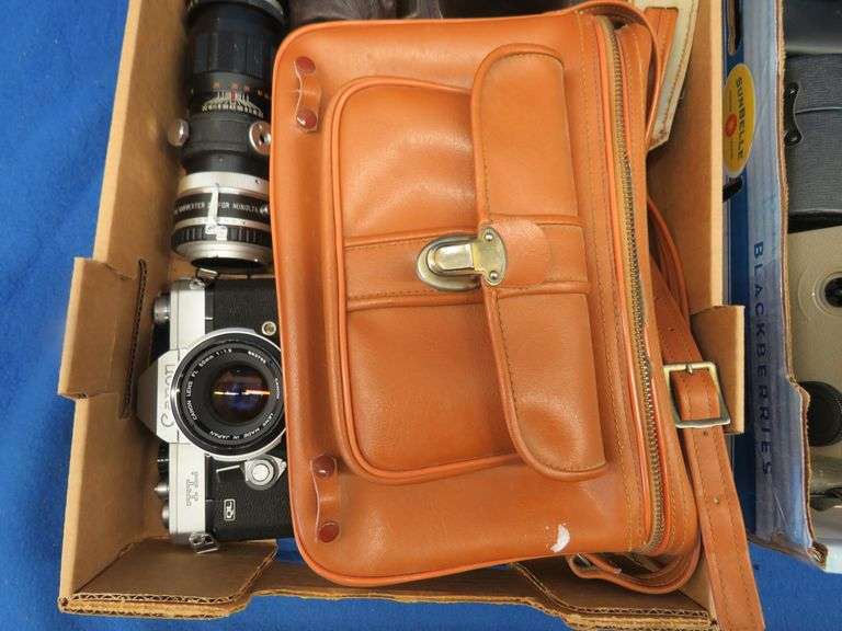 35mm cameras, lenses, cases, and more AAA Auction and Realty
