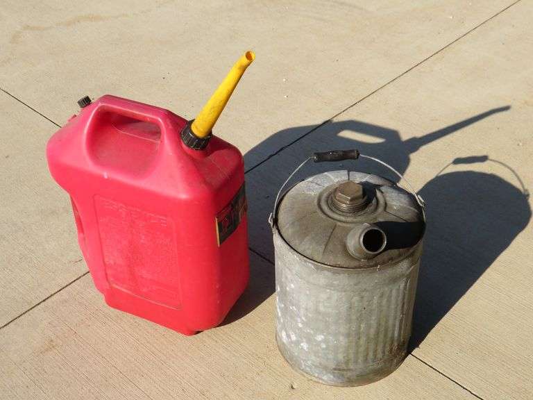 One plastic and one metal gas can AAA Auction and Realty