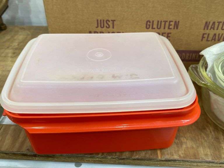 Various Tupperware pieces and glass bake dishes. 4f Lil Dusty Online