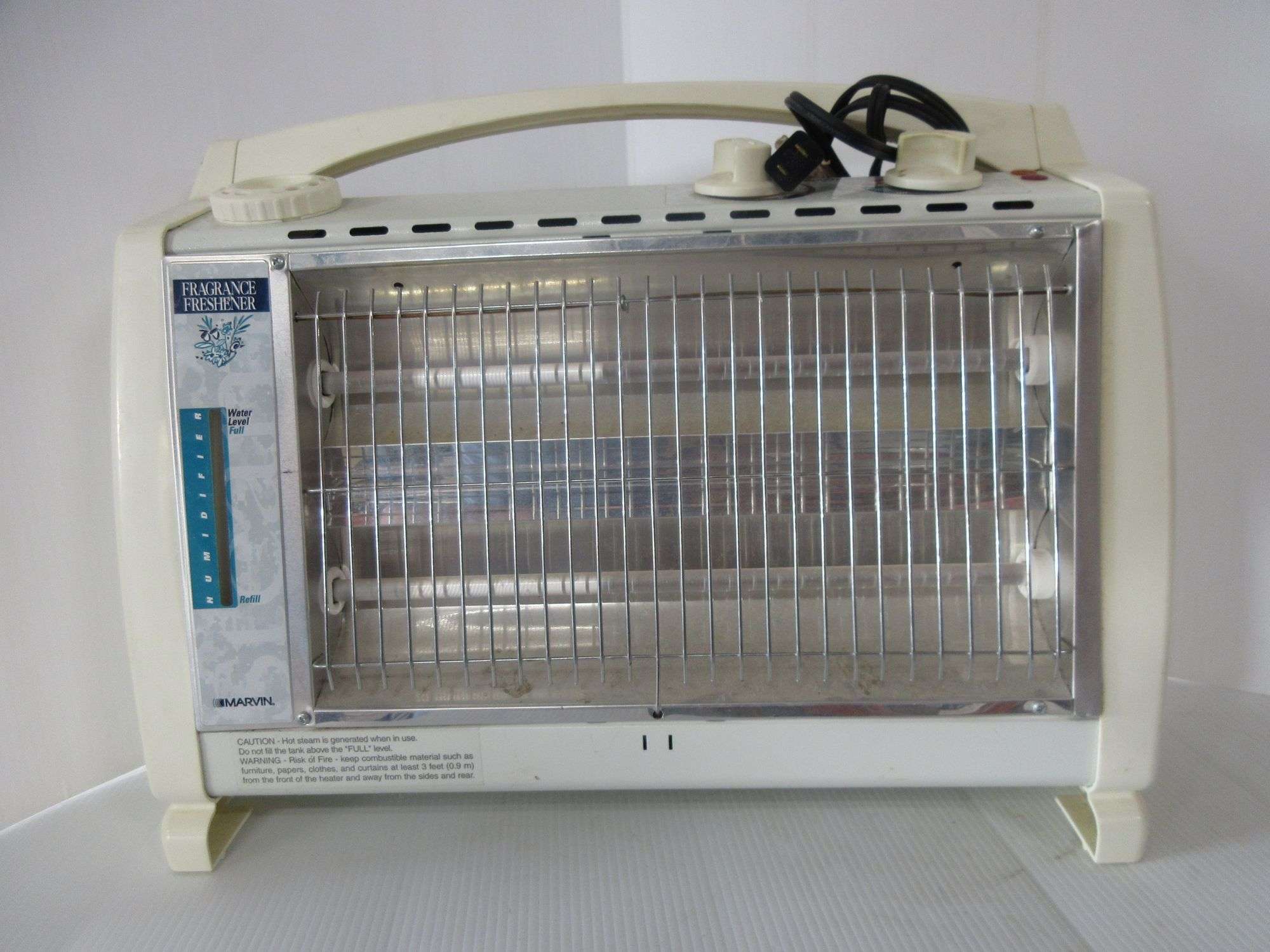 Marvin Electric Heater with Humidifier Feature, Model 5060 - Albrecht  Auction Service