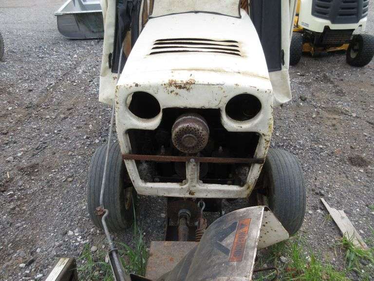 Bolens Tractor with Rear Wheel Weights, Chains, Soft Cab with Hard Top