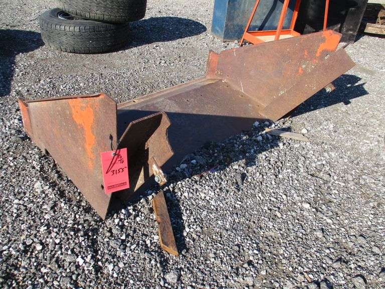 Front loader bucket extension for small farm tractors with forked