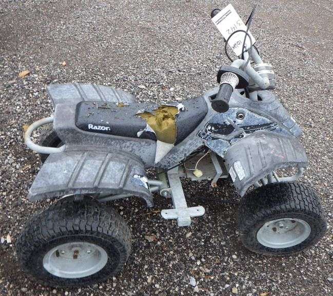 Electric Razor Quad, has wear Albrecht Auction Service