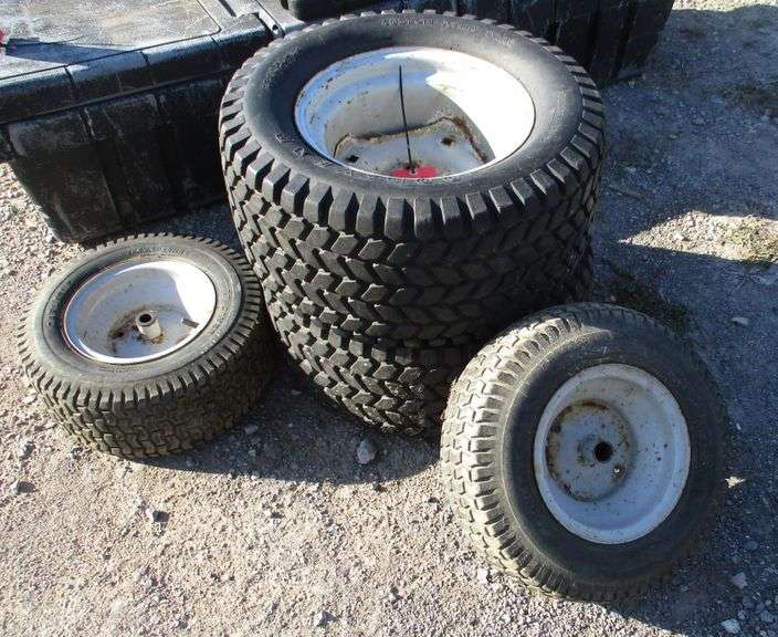 Set of (4) garden tractor tires and wheels Two 23x10.512, Two 16x16