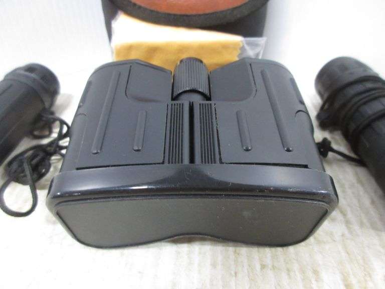 Pair of Jason Graphite 234R 7x25 binoculars with case, 376' at 1000