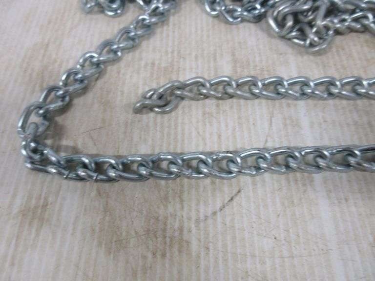 28' of twist link chain, new Albrecht Auction Service