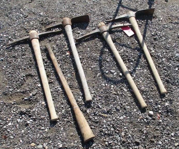 (4) wooden pickaxes, good, used; Wood pick axe handle, new Albrecht