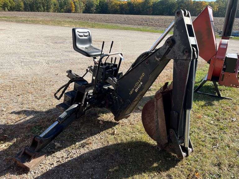New Holland BH114 Skid Steer Backhoe Albrecht Auction Service