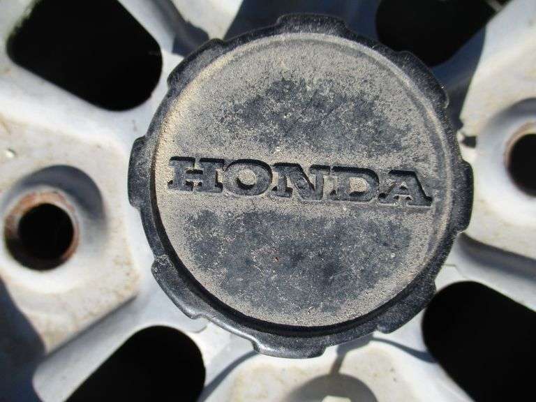 (4) Honda 4wheeler rims and tires, front and rear, 11" Albrecht Auction Service