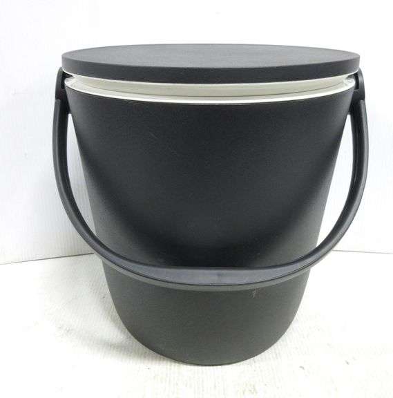 Cooler/table combo, 13 1/2"Dia x 22 3/4" open, has locking median to