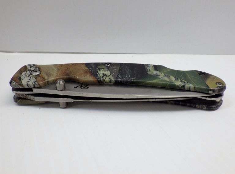 Winchester hunting knife set, includes a round skinner, and a 2blade