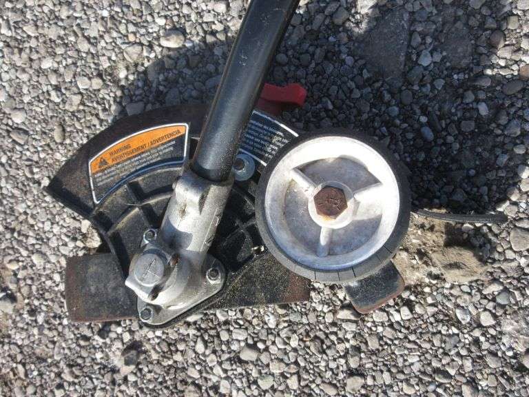 Troy Bilt TB6044 XP fourcycle trimmer with blower and edger