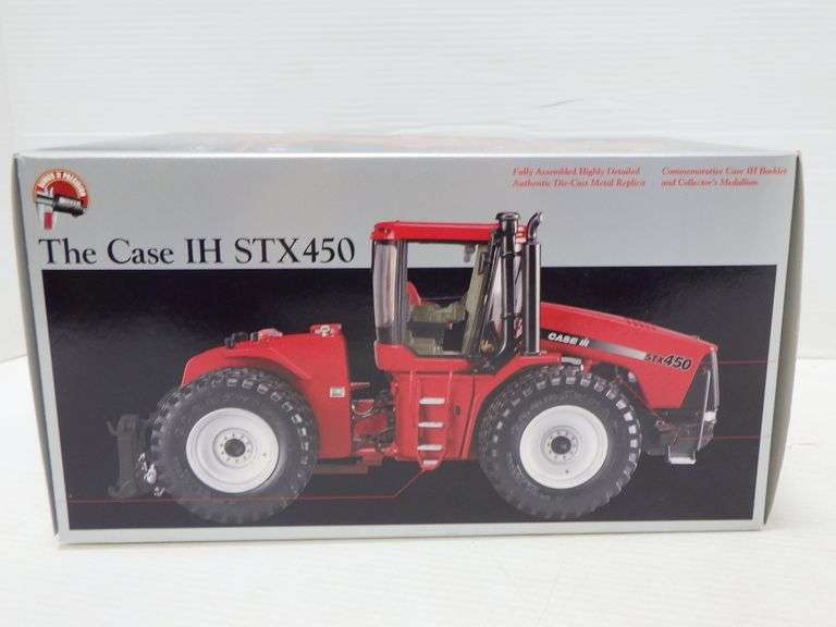 The Case IH STX 450 Tractor, in box, 1/23 scale Albrecht Auction Service