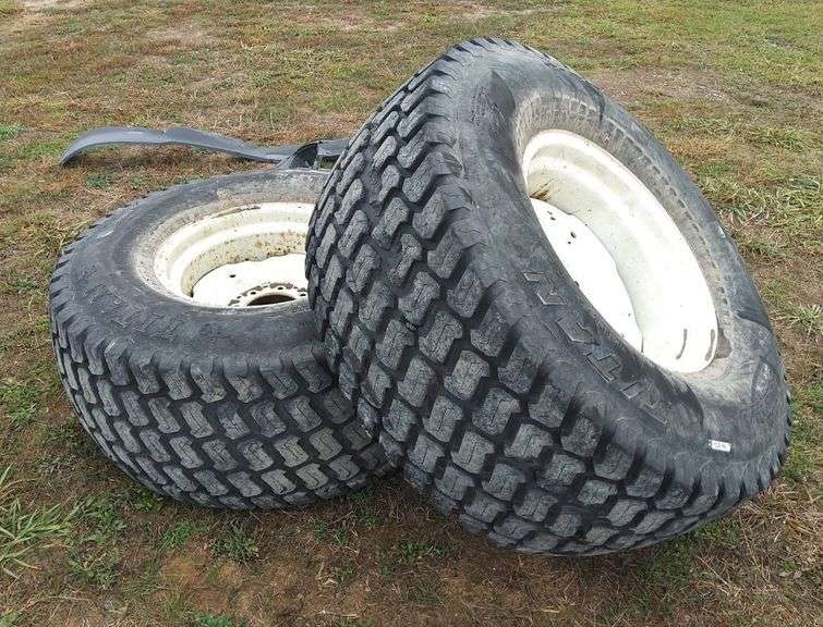 This item Selling ABSOLUTE! Tires from a New Holland TC45 Tractor