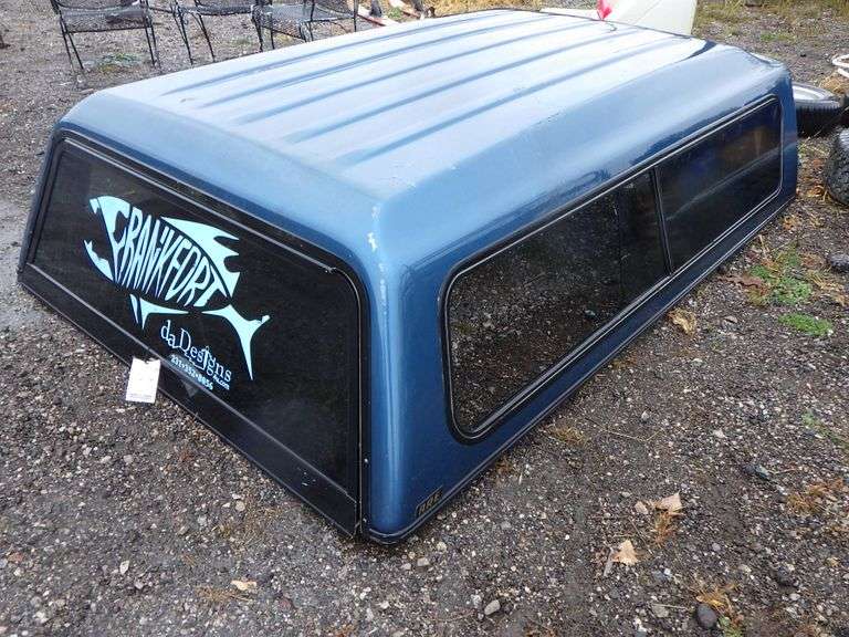 A.R.E. Fiberglass topper for a Chevy long bed truck, 68"W x 100"L, used, some weathering