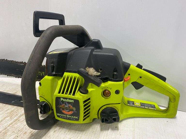 Green Poulan Wood Shark model 1950; Two stroke chainsaw with extra bar