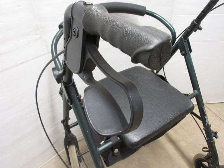 Invacare walker with seat, seat 12"W x 12"H, good condition Albrecht Auction Service