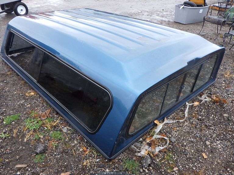 A.R.E. Fiberglass topper for a Chevy long bed truck, 68"W x 100"L, used, some weathering