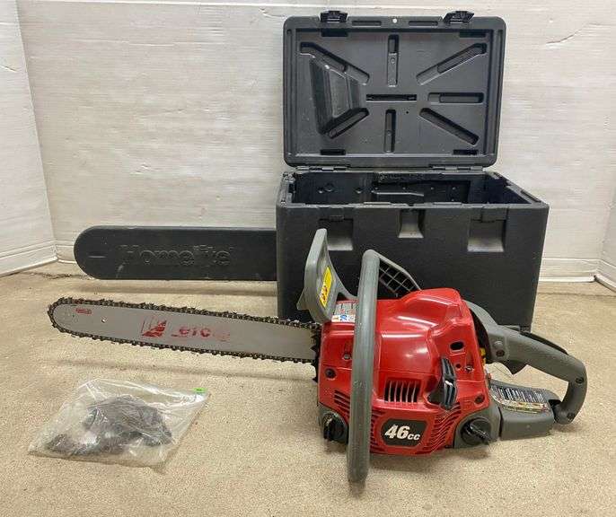 Homelite 46cc chainsaw, 18" bar, includes (3) chains and a case