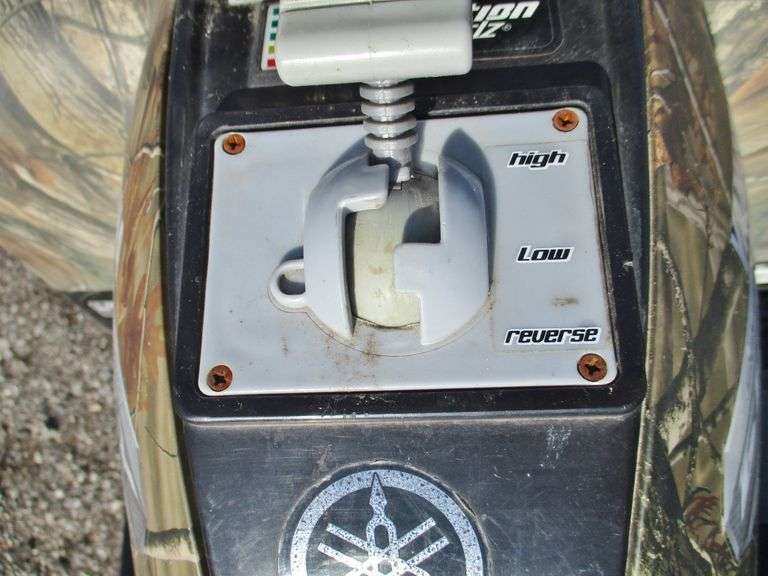 Yamaha Grizzly Power Wheels kids ATV with charger and an older battery